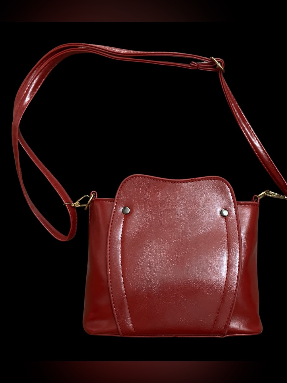 Elegant Red Leatherette Crossbody Bag with Adjustable Strap